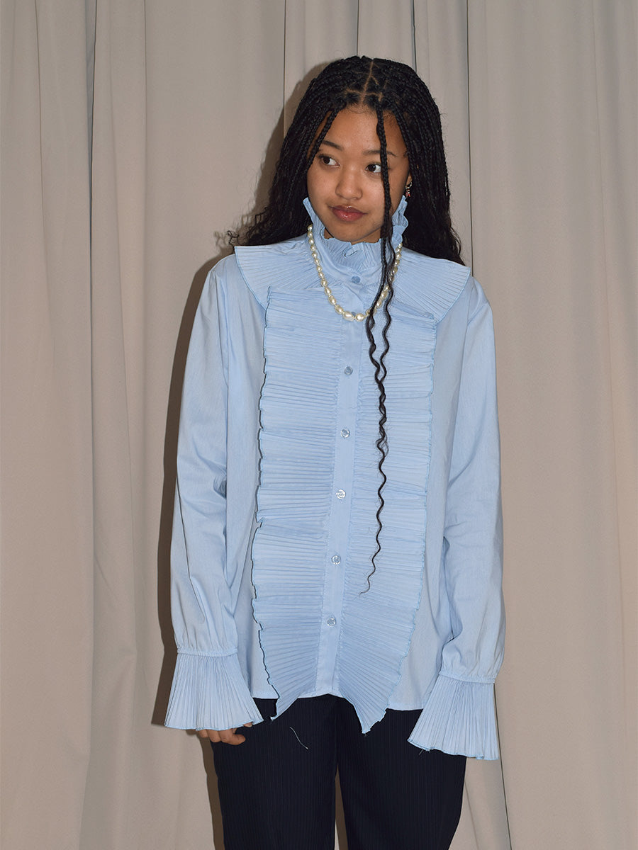 BLUE BLOUSE WITH FRILLS